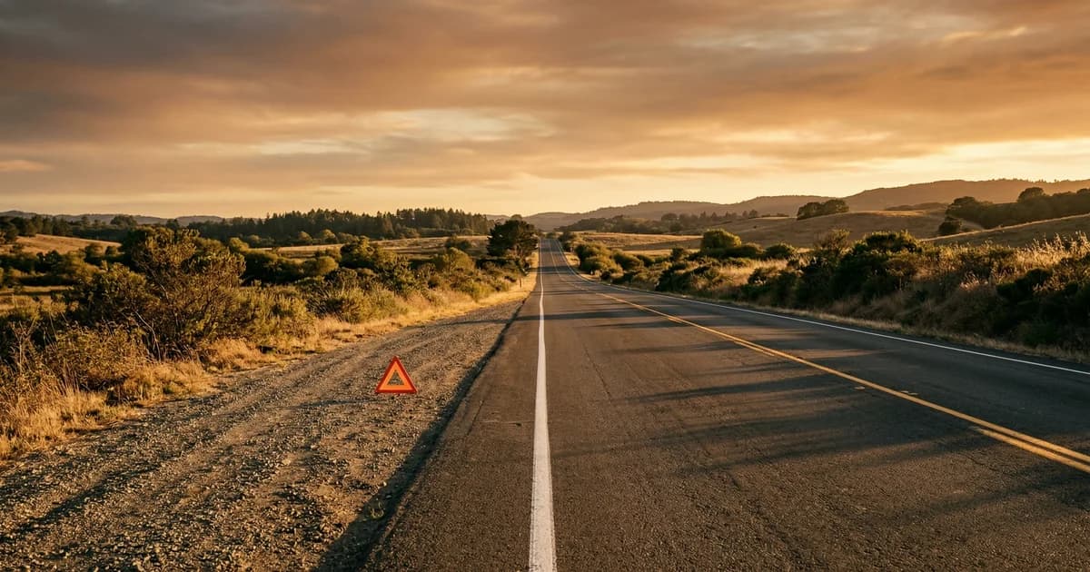 Car parked safely on the shoulder of a road after an accident
